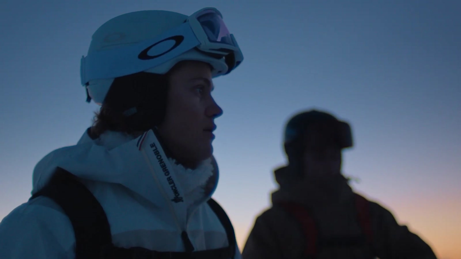 Skiers at sunset in the Moncler Grenoble FW25 campaign